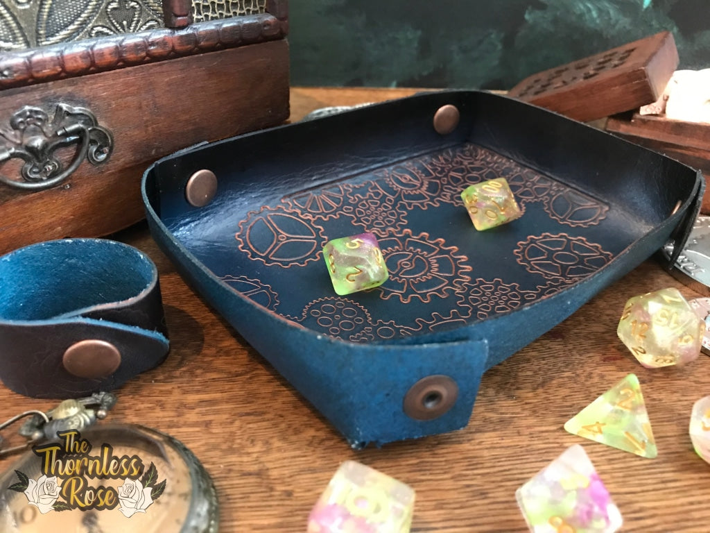 a pile of luggage sitting on top of a wooden floor