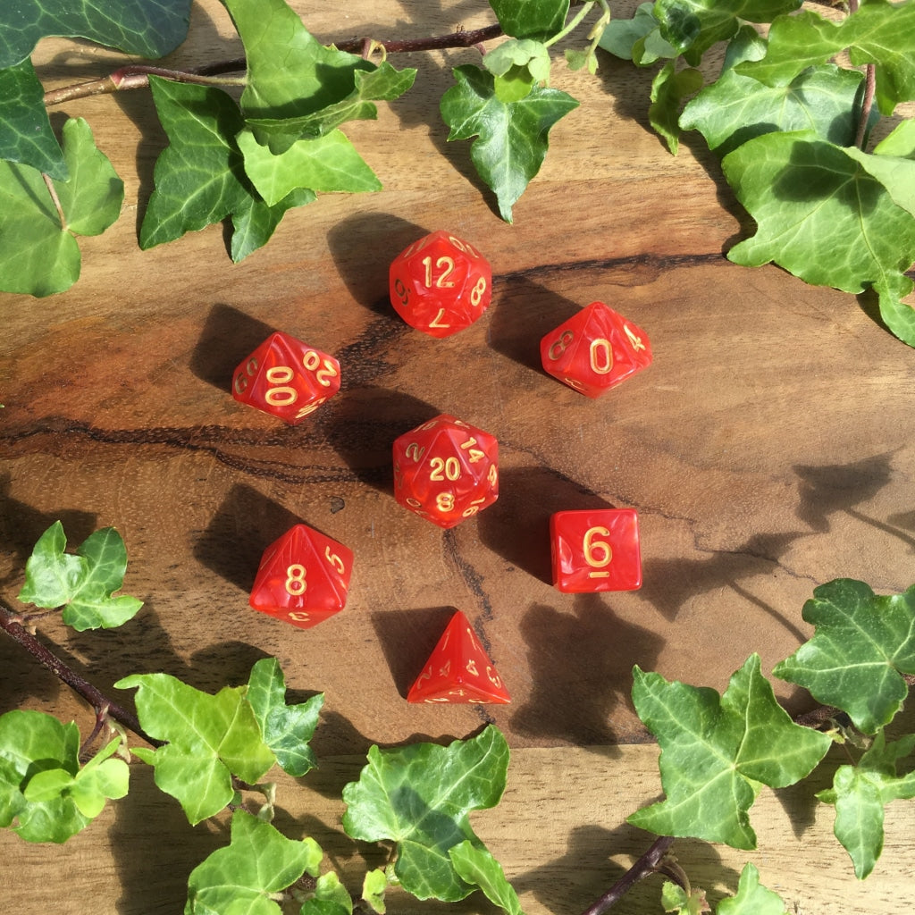 a bunch of red apples that are on a table