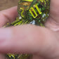 Gold Flake with Black and Green Feathers (Sharp Edge)