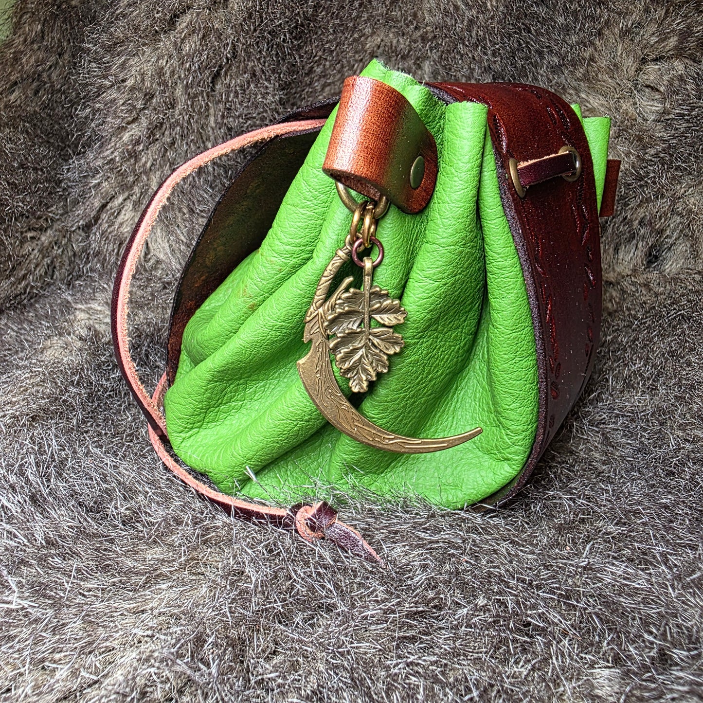 Brown and Bright Green Leather Drawstring Bag with Sickle and Leaf Charm