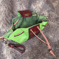 Brown and Bright Green Leather Drawstring Bag with Sickle and Leaf Charm