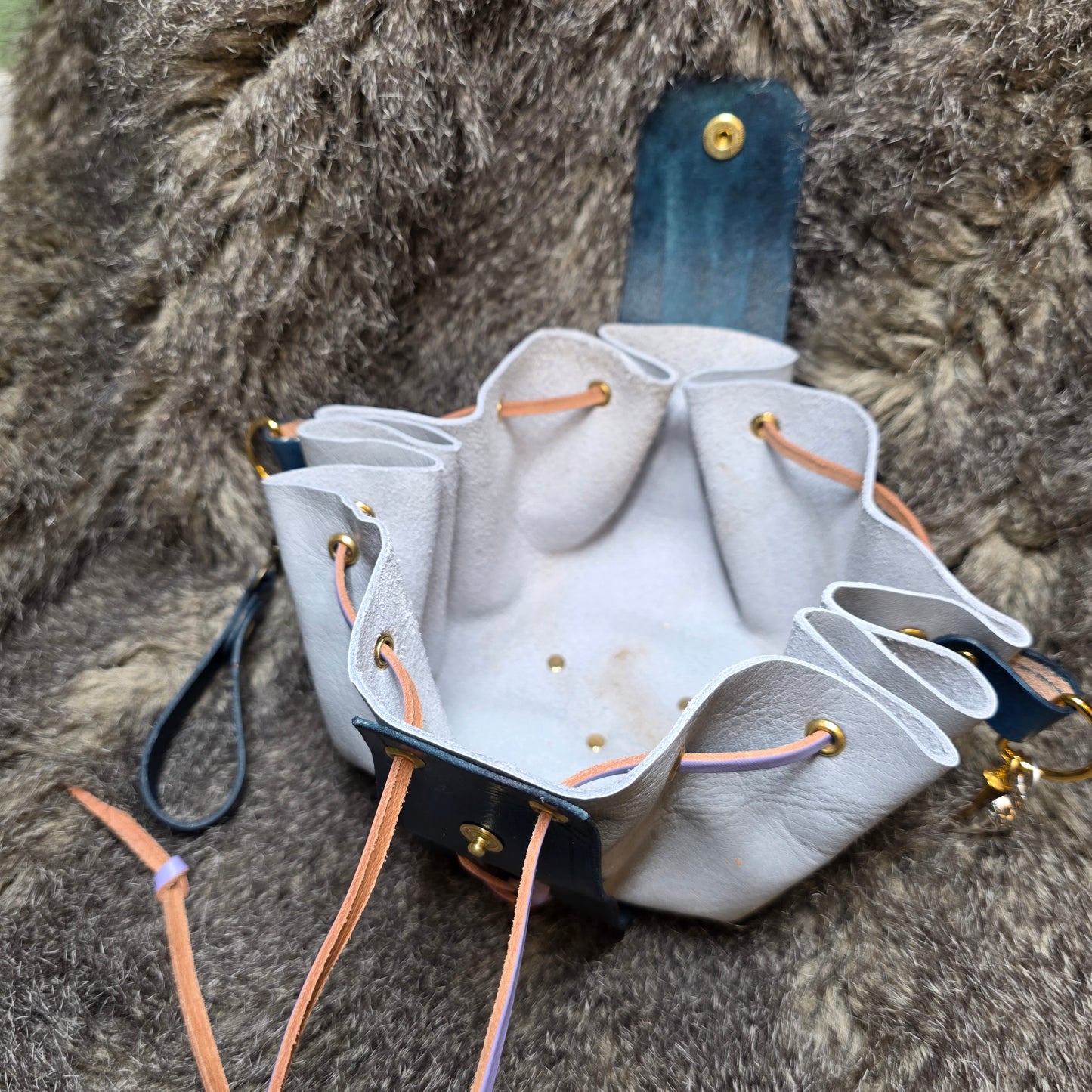 Dark Blue and Grey Leather Drawstring Bag with Sword Charm