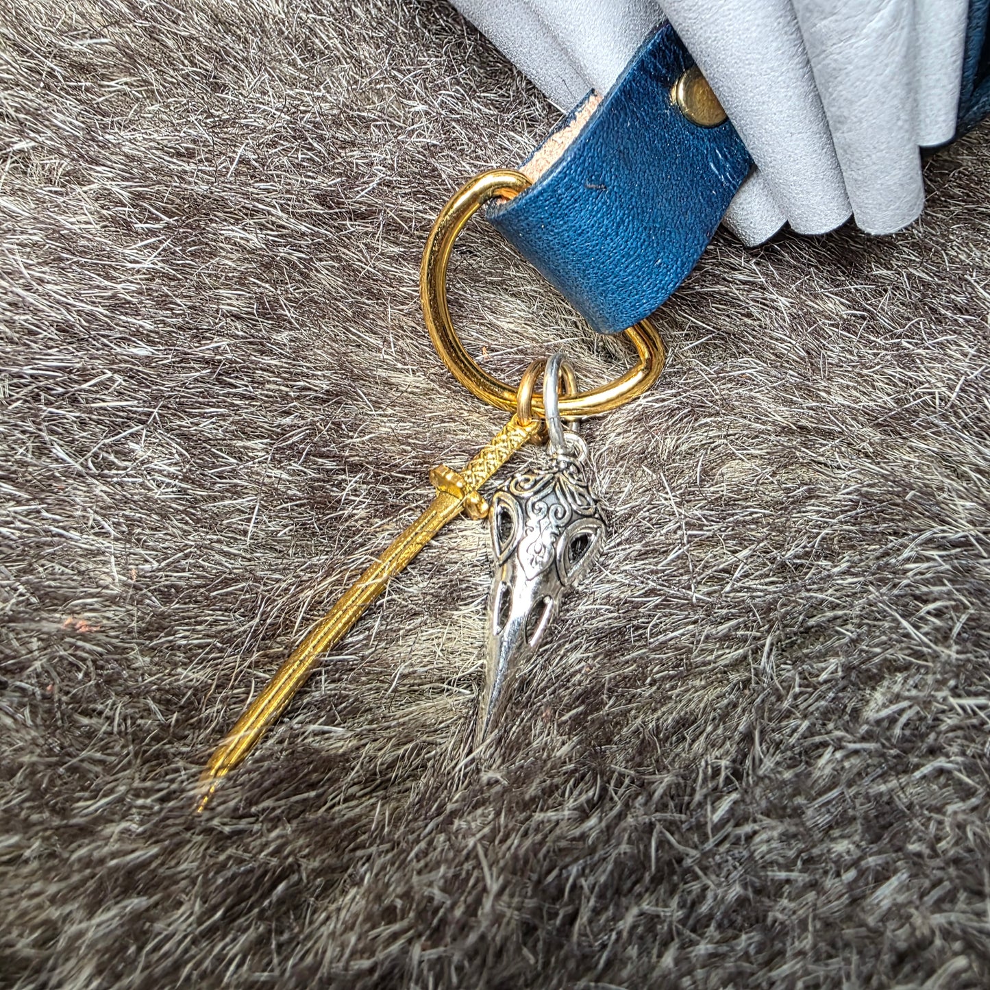 Dark Blue and Grey Leather Drawstring Bag with Sword Charm